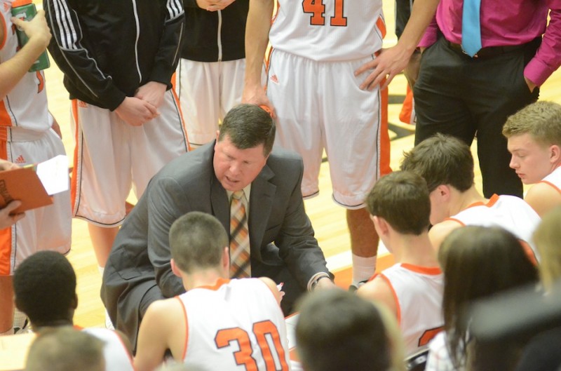 Coach Doug Ogle has some words of wisdom for his Warsaw squad during a timeout Thursday night.
