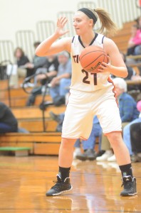 Jodie Carlson directs traffic for the Warsaw offense Friday night.