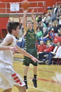 Gage Reinhard hits one of Wawasee's seven three-pointers on the night.