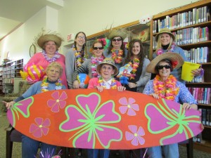 Milford Library staff members are ready for the heat wave! Seated (From left) Dorothy Haney, Sharon Fouts, Mim Eberly.  Standing  are Shari Lambert, Malea Vanlaningham, Heather Pickens, Julie Frew, Heidi Warstler and Maureen Haab. (Photo provided)