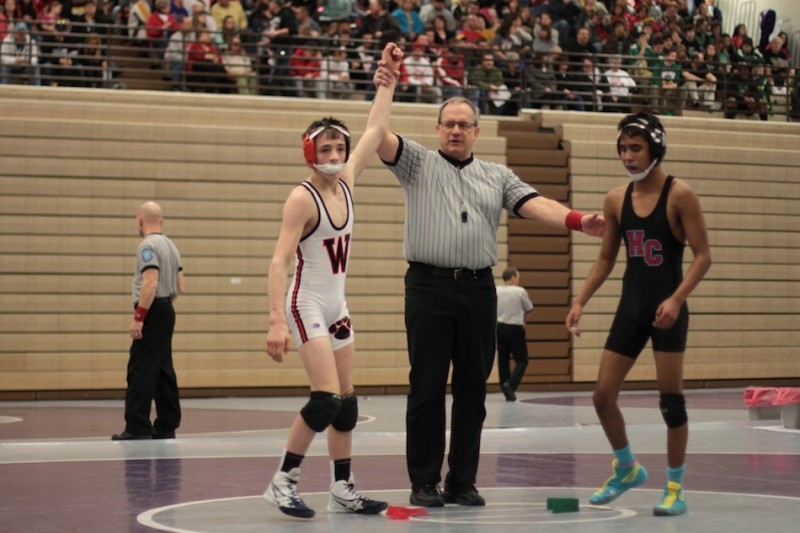 Warsaw freshman Kyle Hatch is recognized after winning his first-round match Saturday at the Merrillville Semistate. The 106-pounder went on to place fourth to earn a spot at the State Finals (Photos provided by Scott Gareiss)