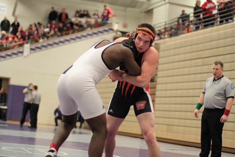 Warsaw senior Anthony Hendrickson competes in a first-round semi state match Saturday at Merrillville.