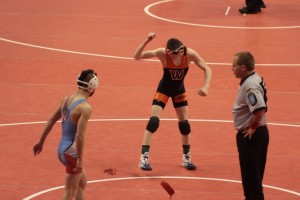 Kyle Hatch celebrates his first-round win at the State Finals in Indianapolis.