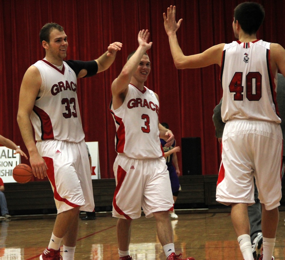 Greg Miller (far left) and Logan Irwin (center) of Grace College earned conference accolades (Photo provided by Grace College Sports Information Department)