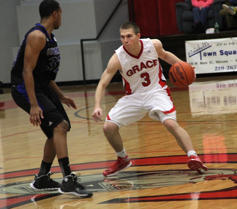 Grace College sophomore guard Logan Irwin makes a move Saturday. The former Whitko High School star had 13 points as the Lancers topped No. 11 St. Francis 76-73 in Winona Lake (Photo provided by Grace College Sports Information Department)