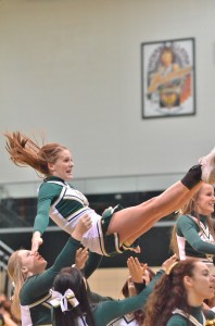 Warrior junior Chelsea Kidd cradles after leading the Wawasee crowd in a cheer. (Photo by Nick Goralczyk)