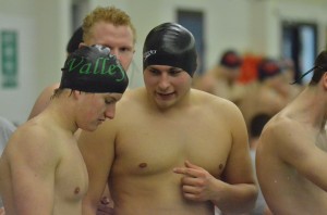 Tom Alexander (center) will be the lone Viking individual competing in the finals on Saturday. Alexander finished seventh in the 100 fly.