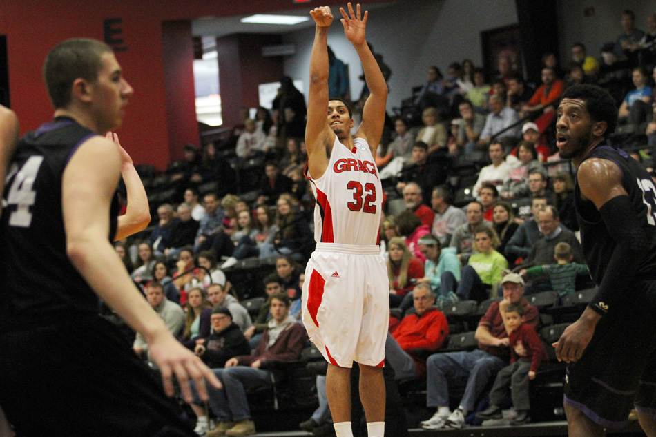 Grace College's Brandon Vanderhegghen hits a 3-pointer against Goshen College Saturday afternoon. (Photo provided by Grace College Sports Information Department)