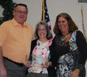 From left are Phil and, Jan Biehl, owners of Small Business of the Year Stamp-n-Toys, and chamber president Sue Ward. (Photo by Martha Stoelting)