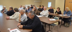 A group of 20, mostly residents of Dewart Lake attended an informal public hearing Monday evening to hear information about a seaplane base request. (Photo by Deb Patterson)
