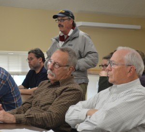 Richard Kempf voices his concerns and objections to a seaplane base on Dewart Lake. (Photo by Deb Patterson)