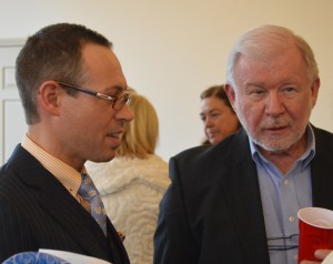 Chad Miner talks with Bob Sanders at the Syracuse-Wawasee Chamber Meet the Candidates Night. Miner is seeking the nomination for county Superior Court 1 judge. (Photo by Deb Patterson)