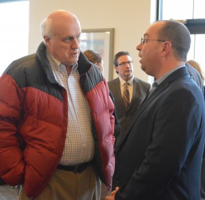 Dr. Kenneth Pennington talks with Curt Nisley, Republican primary candidate for State Rep. District 22 at the Syracuse-Wawasee Chamber Meet the Candidate Night. US Rep. District 2 Democratic Candidate Joe Bock is shown in the background. (Photo by Deb Patterson)