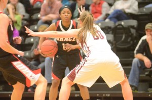 Juaneice Jackson looks for room. The Grace senior poured in 27 points.