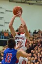 NorthWood's Jonathan Wilkinson shoots over West Noble's Drew Schermerhorn.