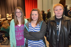WCS sixth grade students Brooklynn McFadden, Brayanna Kelly and Kody Smith were among those who read Kor's autobiography. All three agreed that the presentation was powerful and should return to Warsaw again in the future. (Photo by Alyssa Richardson)