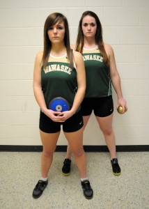 The Wawasee tandem of Savannah Schwartz and Katlyn Kennedy are part of a very strong throwing corps for the Lady Warrior track program. (Photo by Mike Deak)