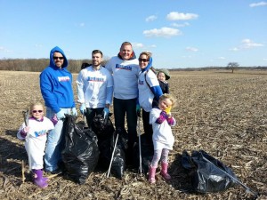 Jon Fussle, current Kosciusko County Councilman and candidate for southern district county commissioner, is flanked by volunteers who helped clean up CR 100 East in an effort to give back to the community. (Photo provided)