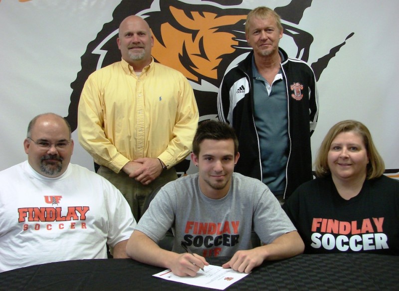 Warsaw senior Matt Williams is headed to play soccer at Findlay. Williams is shown with his parents Jeff and Cari. In back are WCHS Athletic Director Dave Anson and WCHS boys soccer coach Scott Bauer (Photo provided)