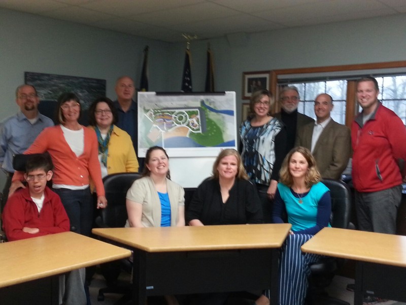 A press conference was held this morning with local community leaders to detail the upcoming construction of Limitless Park. Front row (from left): David Wallen; Shelly Beam, Winona Lake Park Board president; Holly Hummitch, Winona Lake Parks Department director; Erin Porter, Limitless Park committee chair. Back row: Chris Chockley, Jones Petrie Rafinski; Mary Pat Wallen; Suzy Light, Kosciusko Community Foundation;  Craig Allebach, Winona Lake town coordinator; Abby Weiss, KLA/ABC Industries; David Taylor, Kosciusko County Convention and Visitor Recreation Commission; Rich Haddad, K21 Health Foundation president and CEO; and Greg Demopoulos, Kosciusko County Cycling Club president. 