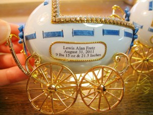 This egg, which was made by Miner for Fretz's grandchild, features a photo of the child within the stroller.  (Photo provided)