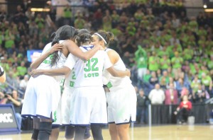 The Irish huddle during a break in the action Monday night.