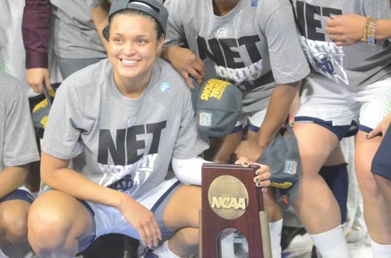 Notre Dame senior star Kayla McBride is all smiles with the regional championship trophy.