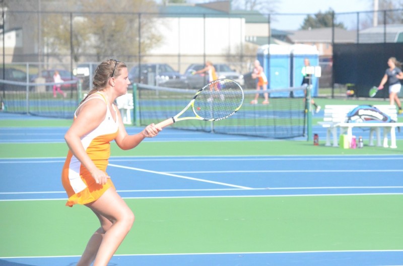 Rachel Alexanders follows through after making a return versus Northridge Wednesday. The Warsaw No. 3 singles player claimed a 6-2, 6-3 win.