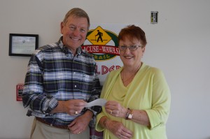 Shown are Donn Baird, left, treasurer of the Syracuse-Wawasee Trail Project, and Kay Young, president of the WPOA.