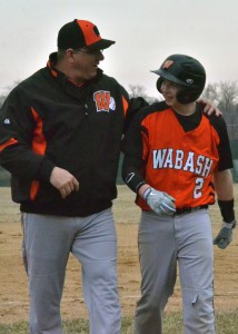 Wabash assistant Jack Holley gives some words of advice to sophomore Treavor Floor. (Photos by Nick Goralczyk)