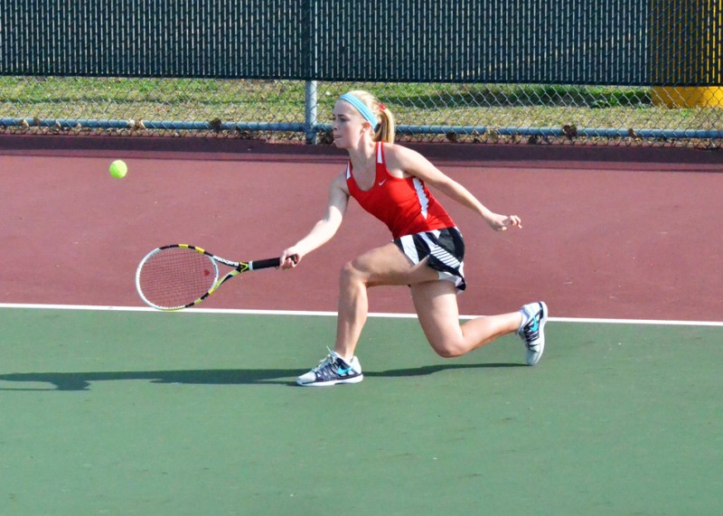 Miranda Kay returns a ball during her No. 1 singles match against Wawasee's Katy Ashpole. (Photos by Nick Goralczyk)