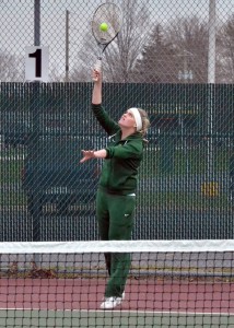 Wawasee junior Natalie Fritz delivers a serve during a doubles match against Manchester. (Photos by Nick Goralczyk)