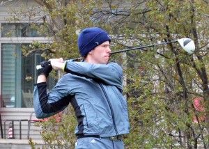 Elkhart Central's Riley Keagle tees off on hole number three at South Shore. Keagle led all golfers with a score of 37. (Photos by Nick Goralczyk)