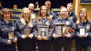 Awards and scholarships were presented to members of the Wawasee FFA Chapter during the group’s annual banquet. Shown in front, from the left are, Elizabeth Zorn, Chapter Star Greenhand; Ashley Beer, Freshman Leadership Award; Kasey Napier, Blue and Gold Award and Agriculture Education Scholarship; Breanna Breske, Blue and Gold Award, Chapter Star Agribusinessman Award, Ray E. Darr Memorial Scholarship and Chapter President Award; and Kylie Fleming, Chore-Time Brock Senior Leadership Scholarship. Standing in back are Austin Beer, sophomore Leadership Award and Chapter Star Production Agriculture Award; Mason Germonprez, Junior Leadership Award; and Jake Templin, Chad Beer Memorial Scholarship. (Photo by Deb Patterson).