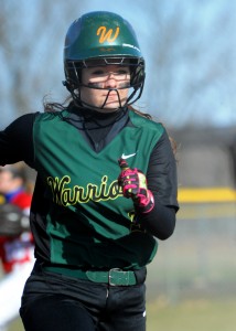 Alexis Graber motors around to score one of Wawasee's 22 runs against West Noble.