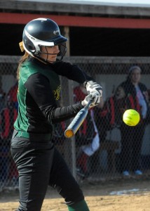 Wawasee's Paige Hlutke zeroes in on a pitch during Wawasee's 22-9 softball win at West Noble Tuesday afternoon. (Photos by Mike Deak)