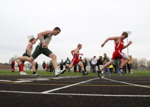 Dakota Brooke of Plymouth leads the runners to the finish line of the junior varsity 100-meter dash.