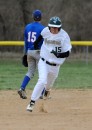 Wawasee's Lucas Garza speeds around the bases during a four-run third inning.