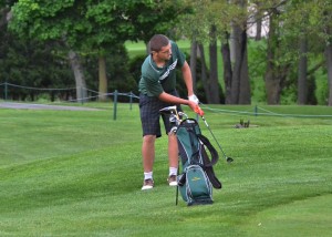 Cal Heinisch chips on to the No. 9 green at Bent Oak during Wawasee's match on Thursday night. (Photos by Nick Goralczyk)