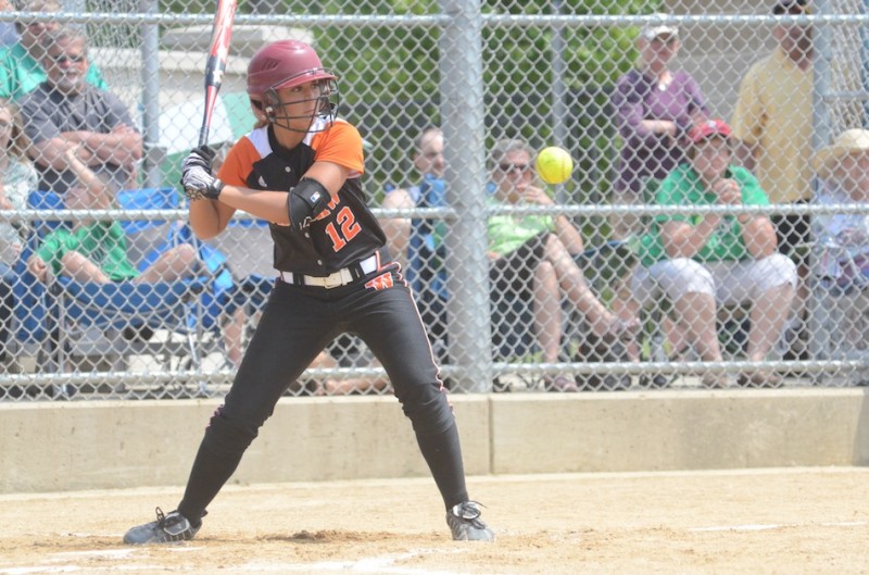 Warsaw's Ashley Ousley watches a pitch Monday in sectional play.  The Tigers lost 8-1 to Concord.