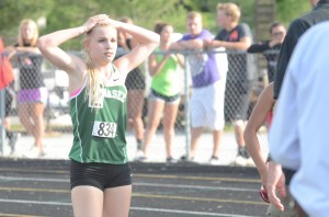 Catherine Yankosky of Wawasee reacts after the prelims of the 200 Tuesday night.