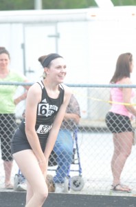 Ann Harvuot reacts after anchoring the 4 X 100 relay team to a regional title Tuesday night.