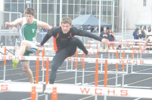 Dylan Campbell competes in the 110 hurdles for the Tigers.