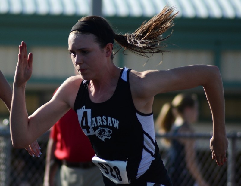 Warsaw senior Ann Harvuot is ready for the regional (File photos by Jim Harris)