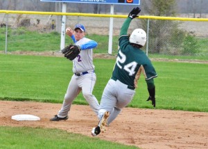 Whitko's Austin Sturgess tags second and attempts to turn the double play against Wawasee on Thursday night.