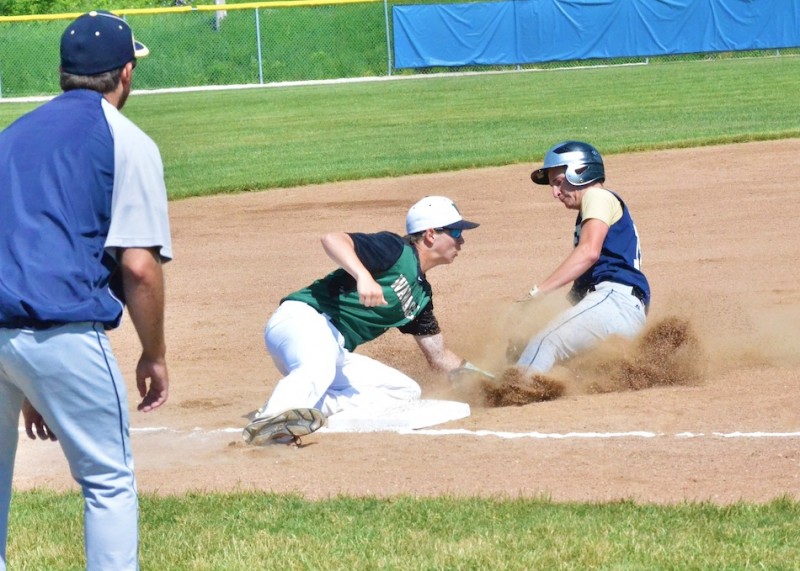 Drew Wright tags out Zac Kropf of Fairfield.