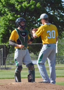 Jake Baylis (left) and Andrew Kennedy have a chat on the mound. 