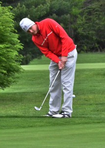 Joel Moyer chips unto the number one green for Goshen at South Shore.