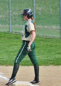 Kayleigh Rhodes gets ready to run at first after getting a hit in the junior varsity game.