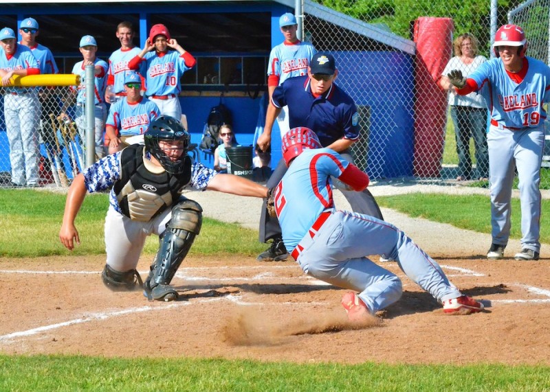 Dalton Schmidt gets tagged out by Seth Patrick in the top of the third inning.